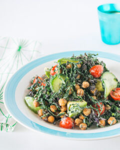 A photo of a kale and chickpea salad