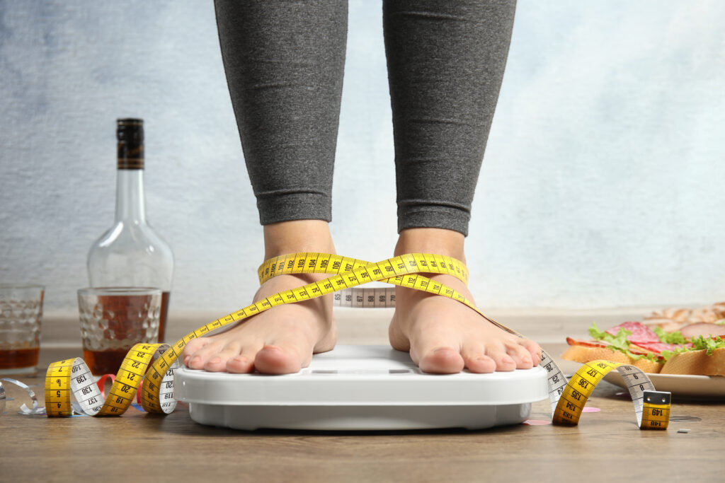 Photo of a woman standing on the scales
